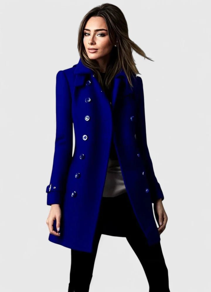 Woman wearing a blue coat on a white background