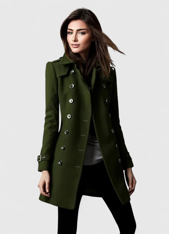 Woman wearing a green coat on a white background