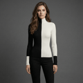Woman wearing a black and white outfit against a gray background
