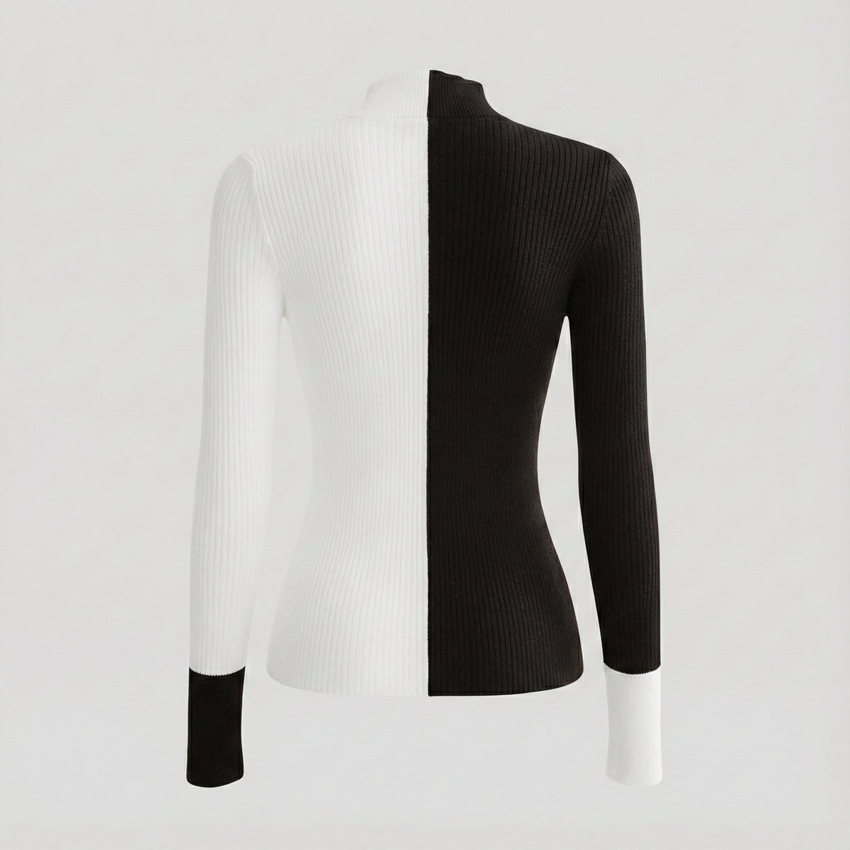 Black and white ribbed sweater on a mannequin against a light gray background