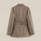 Plaid blazer on a light gray background
