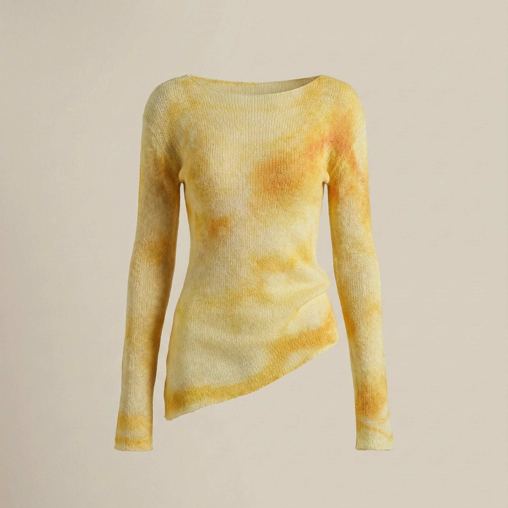 Yellow long-sleeve top on a beige background