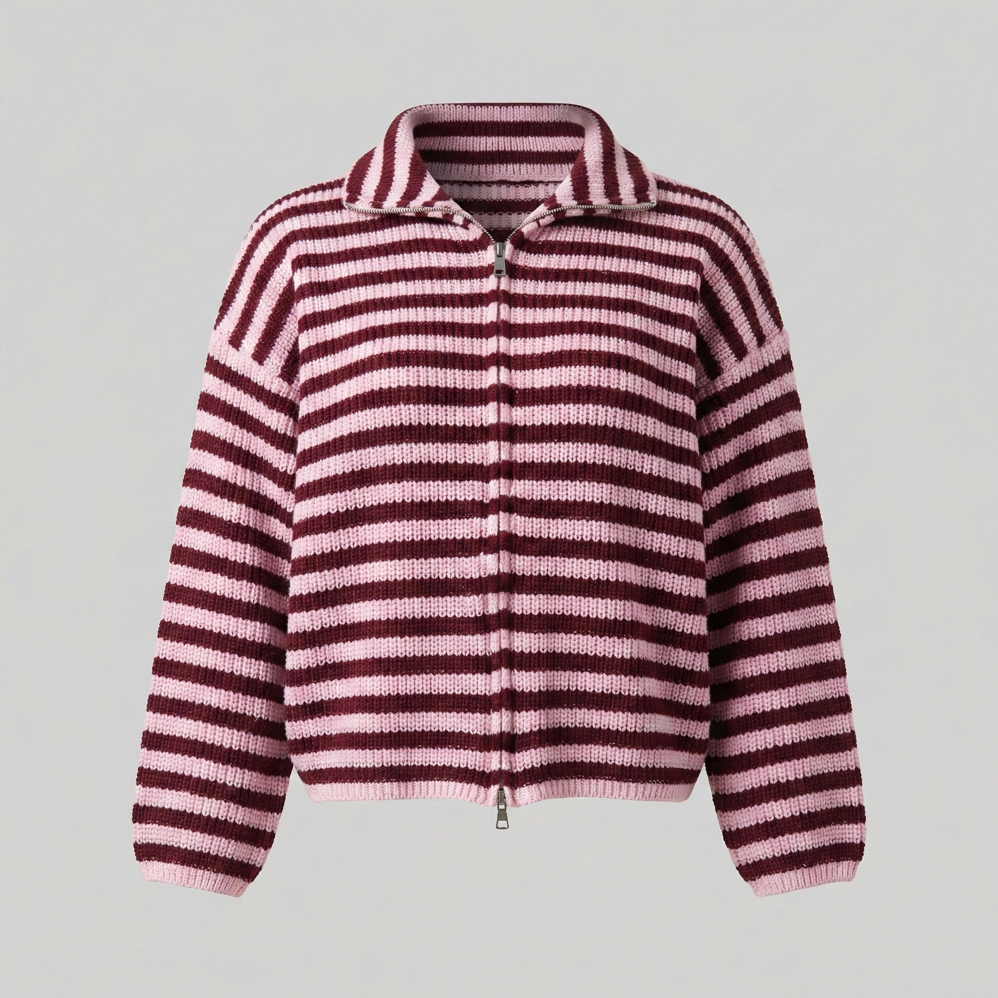 Pink and purple striped sweater on a light gray background