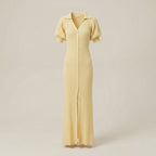 Yellow dress with short sleeves on a beige background