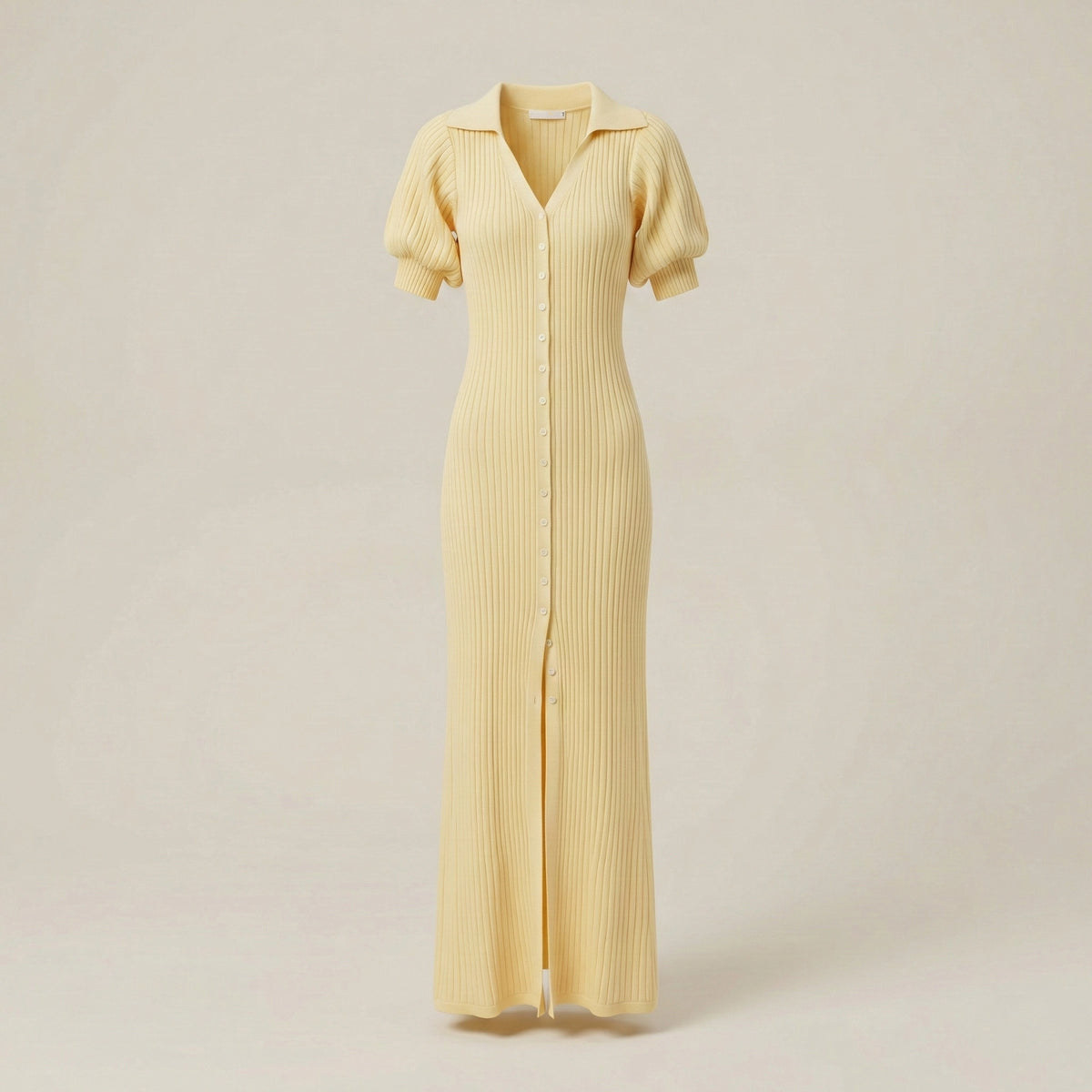 Yellow dress with short sleeves on a beige background