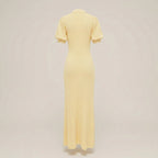 Yellow dress on a beige background